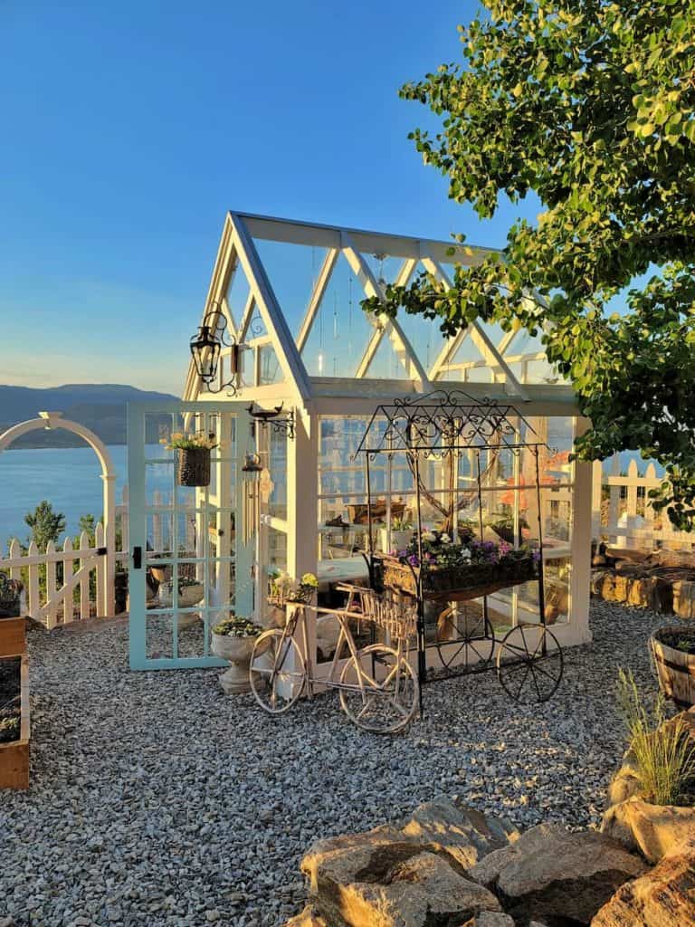 Greenhouse with lake in the background